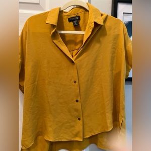 Women’s short sleeved button down size medium